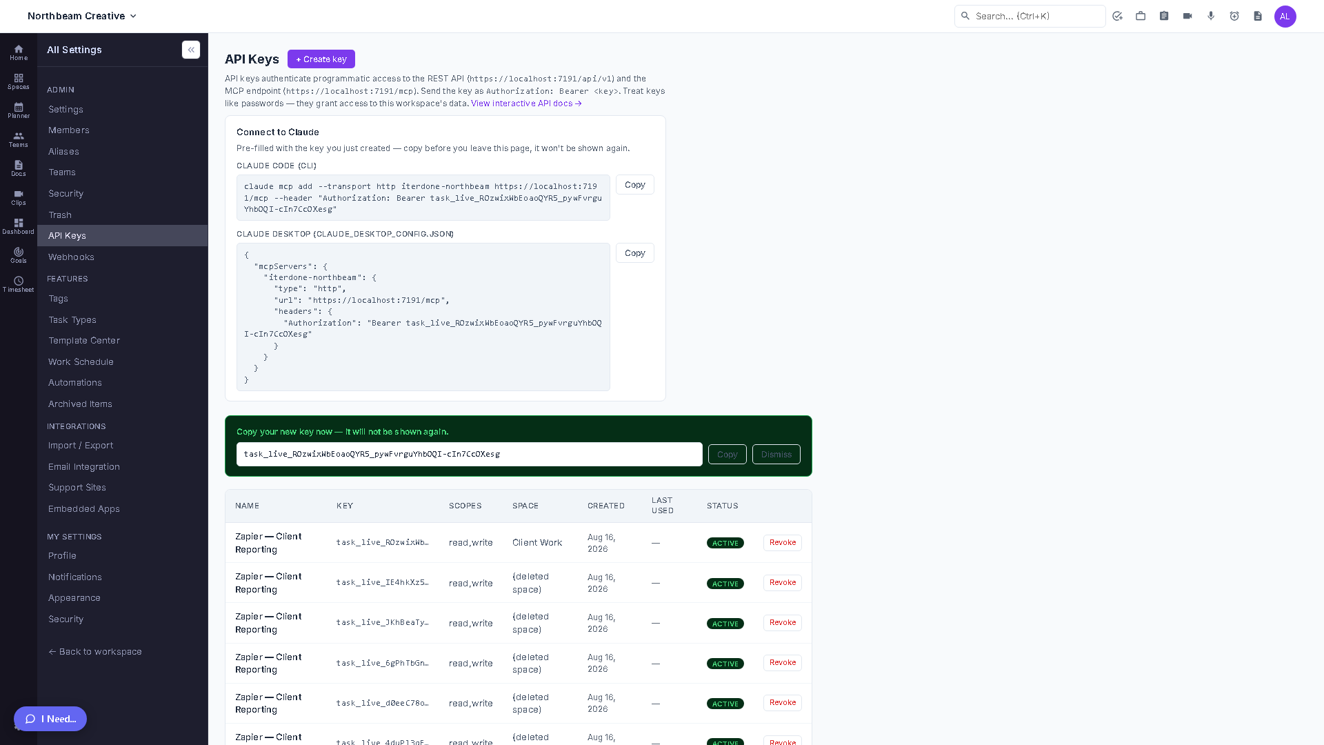 The API Keys admin page showing the key table with scopes and space column, next to the ready-to-paste Claude Code MCP connection snippet.